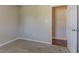 Bedroom with an open door and neutral paint color at 42 Breckenridge Dr, Powder Springs, GA 30127