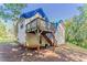 Exterior view of a home's back deck and stairs at 42 Breckenridge Dr, Powder Springs, GA 30127