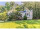 Charming home with a well-maintained front yard, lush greenery, and inviting front porch at 42 Breckenridge Dr, Powder Springs, GA 30127