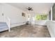 Screened-in back porch with stairs leading down to the backyard at 522 Stell Rd, Woodstock, GA 30188