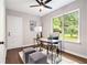 Cozy office with a unique desk, hardwood floors, and a view to the yard at 522 Stell Rd, Woodstock, GA 30188