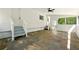 View of covered patio with steps to backyard, exterior door, and screen door access to the home at 522 Stell Rd, Woodstock, GA 30188