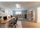 Finished basement is a great space for a home office with built in shelving for storage at 142 Wellspring Pt, Hiram, GA 30141