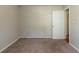 Cozy bedroom with neutral walls and carpet flooring at 142 Wellspring Pt, Hiram, GA 30141