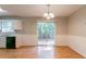 Bright dining area with sliding glass doors leading to the outdoor deck at 142 Wellspring Pt, Hiram, GA 30141