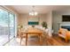 Elegant dining area features a large table and a stylishly decorated space at 142 Wellspring Pt, Hiram, GA 30141