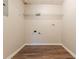 The laundry room is ready for appliances with essential hookups and a convenient overhead shelf at 142 Wellspring Pt, Hiram, GA 30141