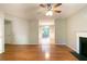 Spacious living room with a hardwood floor leading to the dining area at 142 Wellspring Pt, Hiram, GA 30141