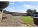 Fenced backyard featuring a combination of grass and mulch, perfect for outdoor entertaining at 1885 Hickory Station Cir, Snellville, GA 30078