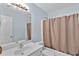 Bathroom featuring a bathtub/shower combination with a curtain at 1885 Hickory Station Cir, Snellville, GA 30078