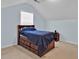 Bedroom featuring a bed with storage and a window at 1885 Hickory Station Cir, Snellville, GA 30078