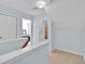 Bright hallway leading to a bathroom and a bedroom at 1885 Hickory Station Cir, Snellville, GA 30078