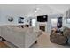 Living area with a fireplace, and large television for relaxing and entertaining at 1885 Hickory Station Cir, Snellville, GA 30078
