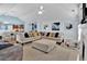 Open living space with high ceilings, a fireplace, a comfortable sectional, and an eat-in kitchen at 1885 Hickory Station Cir, Snellville, GA 30078