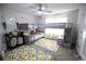 Playful ' bedroom featuring bunk beds, alphabet rug, and a whimsical decor at 5663 Eternal Dr, Atlanta, GA 30349