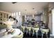 Modern kitchen features stainless appliances, gray cabinets, kitchen island and breakfast bar seating at 5663 Eternal Dr, Atlanta, GA 30349