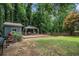 This backyard features a deck and gazebo, perfect for entertaining at 609 Ashton Manor Dr, Loganville, GA 30052