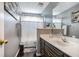 Bathroom featuring tile floors, a sink with dark wood cabinets and decor at 609 Ashton Manor Dr, Loganville, GA 30052