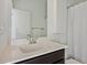 Bathroom with a white vanity and sink, a modern faucet, and shower at 2034 Rockledge Ne Rd, Atlanta, GA 30324