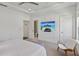 Bedroom with a ceiling fan, modern art and a view of the bathroom at 2034 Rockledge Ne Rd, Atlanta, GA 30324