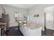 A spacious kitchen featuring stainless steel appliances, granite countertops, and an island with barstool seating at 2034 Rockledge Ne Rd, Atlanta, GA 30324