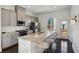 Modern kitchen with stainless steel appliances and a large island at 2034 Rockledge Ne Rd, Atlanta, GA 30324