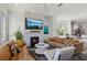 Inviting living room with comfortable leather sofas and a modern fireplace at 2034 Rockledge Ne Rd, Atlanta, GA 30324