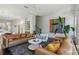 Inviting living room with leather sofas, large windows, and modern décor at 2034 Rockledge Ne Rd, Atlanta, GA 30324