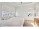 Bright main bedroom with two large windows and a neutral color palette at 2034 Rockledge Ne Rd, Atlanta, GA 30324