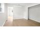 Bright bedroom boasts hardwood floors and fresh, neutral paint, ready for your personal touch at 4376 Riverwood Cir, Decatur, GA 30035