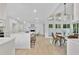 Spacious open kitchen with modern appliances, large island, and hardwood flooring at 4376 Riverwood Cir, Decatur, GA 30035
