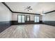 Spacious basement with natural light, stylish flooring, and dark trim at 5492 Glenridge Dr # 536, Atlanta, GA 30342