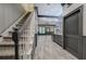 Finished basement with bar area, stylish flooring, and a staircase at 5492 Glenridge Dr # 536, Atlanta, GA 30342