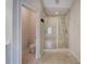 Bathroom featuring a toilet and tiled glass shower with built in bench at 5492 Glenridge Dr # 536, Atlanta, GA 30342