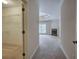 Hallway featuring closet doorway and bedroom entrance with fireplace and sliding glass doors at 5492 Glenridge Dr # 536, Atlanta, GA 30342