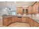 Spacious kitchen featuring granite countertops, stainless steel appliances, and custom cabinetry at 5492 Glenridge Dr # 536, Atlanta, GA 30342
