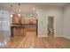 View of kitchen showing open floor plan with granite countertops and stainless steel appliances at 5492 Glenridge Dr # 536, Atlanta, GA 30342