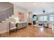 Comfortable living room with hardwood floors, fireplace, and built-in shelving at 5492 Glenridge Dr # 536, Atlanta, GA 30342
