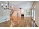 Bright and airy living space featuring hardwood floors, fireplace, and built-in shelves at 5492 Glenridge Dr # 536, Atlanta, GA 30342