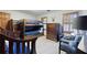 Bedroom with bunk beds, wooden furniture, windows with shutters, and neutral carpet at 2041 Millspring Nw Way, Kennesaw, GA 30152