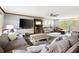 Inviting living room with comfortable seating, fireplace, and lots of natural light at 2041 Millspring Nw Way, Kennesaw, GA 30152