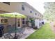 Paver patio with a table, chairs, and grill, perfect for outdoor entertaining at 3982 Brockenhurst Dr, Buford, GA 30519