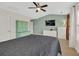 Bedroom featuring vaulted ceilings, neutral decor, and a ceiling fan at 3982 Brockenhurst Dr, Buford, GA 30519