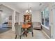 Formal dining area featuring a table with chairs, a hutch, and lots of natural light at 3982 Brockenhurst Dr, Buford, GA 30519