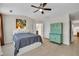 Bright main bedroom with ensuite bathroom, ceiling fan, and plenty of space at 3982 Brockenhurst Dr, Buford, GA 30519