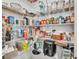 Organized pantry with shelving, filled with a variety of food and kitchen supplies at 3982 Brockenhurst Dr, Buford, GA 30519