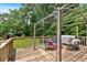 Deck perfect for outdoor entertaining with pergola and green backyard views at 6863 Recreation Ln, Acworth, GA 30102