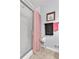 Cozy bathroom with tile floors, shower with glass door, and pink and black accents at 6863 Recreation Ln, Acworth, GA 30102