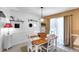 Charming dining area with bright lighting and seating for four at 6863 Recreation Ln, Acworth, GA 30102