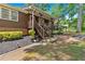 Inviting home featuring a cozy covered porch, manicured landscaping, and an accessible walkway at 6863 Recreation Ln, Acworth, GA 30102